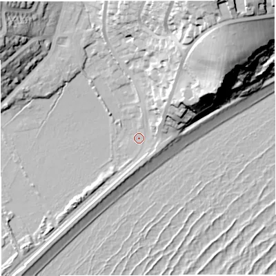 Shaded relief map of the ground around DT36PU, computed from Environment Agency LiDAR. The ground here sits at about 2 m above sea level and falls 48 m across the surrounding 800 m. Surface water reaching this point runs off ground lying to the north-north-east, 23.0 m higher.