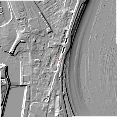 Shaded relief map of the ground around DT47AX, computed from Environment Agency LiDAR. The ground here sits at about 2 m above sea level and falls 7 m across the surrounding 800 m. Surface water reaching this point runs off ground lying to the south, 4.2 m higher.