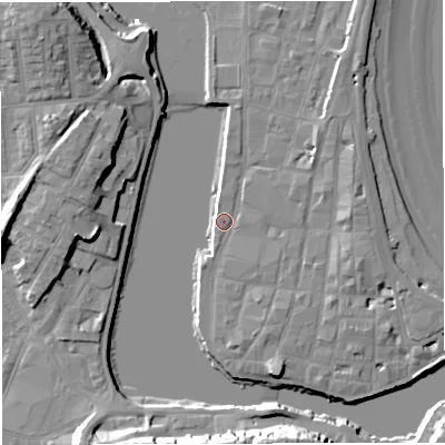 Shaded relief map of the ground around DT48NF, computed from Environment Agency LiDAR. The ground here sits at about 2 m above sea level and falls 19 m across the surrounding 800 m. Surface water reaching this point runs off ground lying to the west-north-west, 10.9 m higher.