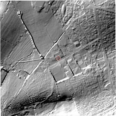 Shaded relief map of the ground around DT49DN, computed from Environment Agency LiDAR. The ground here sits at about 15 m above sea level and falls 24 m across the surrounding 800 m. Surface water reaching this point runs off ground lying to the south, 5.2 m higher.