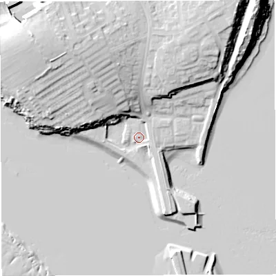 Shaded relief map of the ground around DT49GE, computed from Environment Agency LiDAR. The ground here sits at about 3 m above sea level and falls 24 m across the surrounding 800 m. Surface water reaching this point runs off ground lying to the north-west, 19.8 m higher.