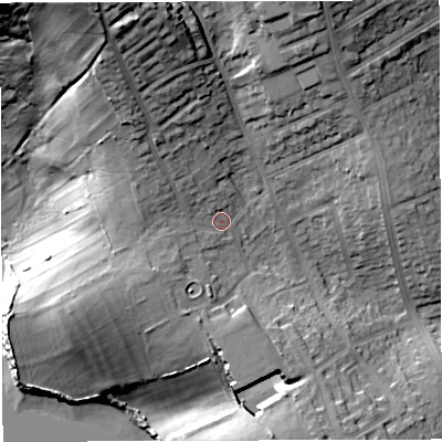 Shaded relief map of the ground around DT49NR, computed from Environment Agency LiDAR. The ground here sits at about 18 m above sea level and falls 44 m across the surrounding 800 m. Surface water reaching this point runs off ground lying to the north-north-west, 21.7 m higher.