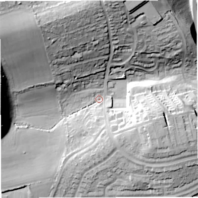 Shaded relief map of the ground around DT49RT, computed from Environment Agency LiDAR. The ground here sits at about 5 m above sea level and falls 34 m across the surrounding 800 m. Surface water reaching this point runs off ground lying to the north-west, 32.6 m higher.