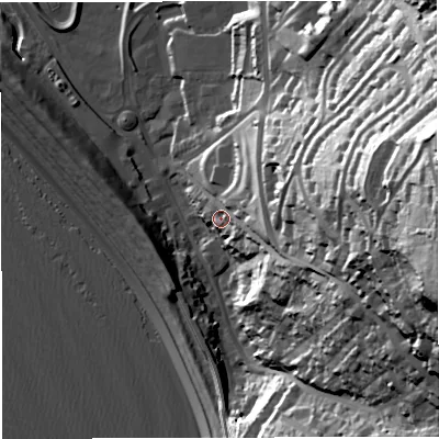 Shaded relief map of the ground around DT51AH, computed from Environment Agency LiDAR. The ground here sits at about 11 m above sea level and falls 79 m across the surrounding 800 m. Surface water reaching this point runs off ground lying to the east, 64.4 m higher.
