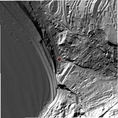 Shaded relief map of the ground around DT51AP, computed from Environment Agency LiDAR. The ground here sits at about 7 m above sea level and falls 122 m across the surrounding 800 m. Surface water reaching this point runs off ground lying to the south-east, 114.9 m higher.
