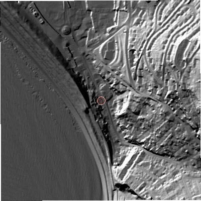 Shaded relief map of the ground around DT51AW, computed from Environment Agency LiDAR. The ground here sits at about 5 m above sea level and falls 74 m across the surrounding 800 m. Surface water reaching this point runs off ground lying to the east, 66.2 m higher.