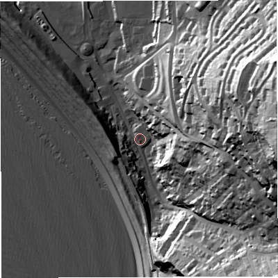 Shaded relief map of the ground around DT51AY, computed from Environment Agency LiDAR. The ground here sits at about 6 m above sea level and falls 76 m across the surrounding 800 m. Surface water reaching this point runs off ground lying to the east, 68.7 m higher.