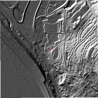 Shaded relief map of the ground around DT51FE, computed from Environment Agency LiDAR. The ground here sits at about 7 m above sea level and falls 69 m across the surrounding 800 m. Surface water reaching this point runs off ground lying to the east-south-east, 33.2 m higher.