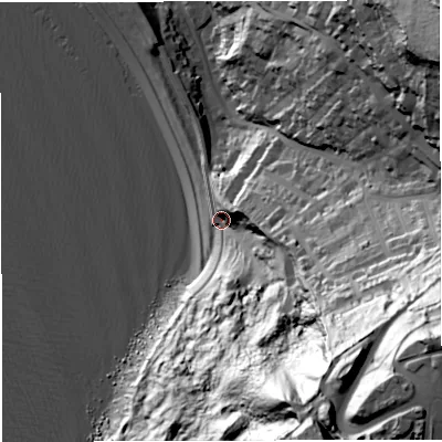 Shaded relief map of the ground around DT51LN, computed from Environment Agency LiDAR. The ground here sits at about 11 m above sea level and falls 123 m across the surrounding 800 m. Surface water reaching this point runs off ground lying to the east-south-east, 34.1 m higher.