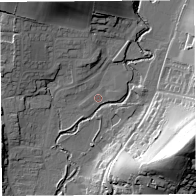 Shaded relief map of the ground around DT63BE, computed from Environment Agency LiDAR. The ground here sits at about 10 m above sea level and falls 60 m across the surrounding 800 m. Surface water reaching this point runs off ground lying to the east-north-east, 1.3 m higher.