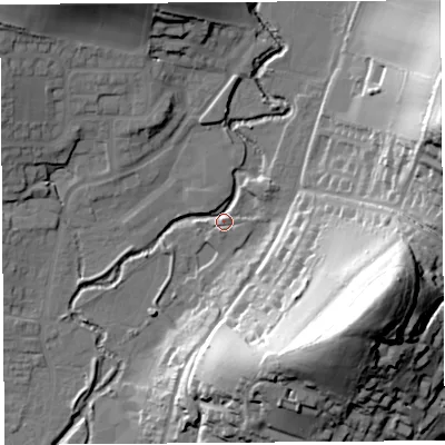 Shaded relief map of the ground around DT63FY, computed from Environment Agency LiDAR. The ground here sits at about 10 m above sea level and falls 60 m across the surrounding 800 m. Surface water reaching this point runs off ground lying to the east-south-east, 57.7 m higher.