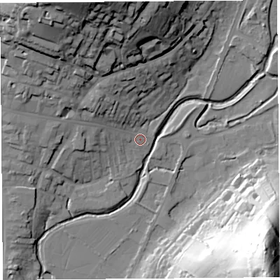 Shaded relief map of the ground around DT63LW, computed from Environment Agency LiDAR. The ground here sits at about 9 m above sea level and falls 75 m across the surrounding 800 m. Surface water reaching this point runs off ground lying to the north-west, 10.9 m higher.