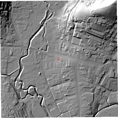Shaded relief map of the ground around DT63QP, computed from Environment Agency LiDAR. The ground here sits at about 10 m above sea level and falls 60 m across the surrounding 800 m. Surface water reaching this point runs off ground lying to the east-south-east, 5.7 m higher.