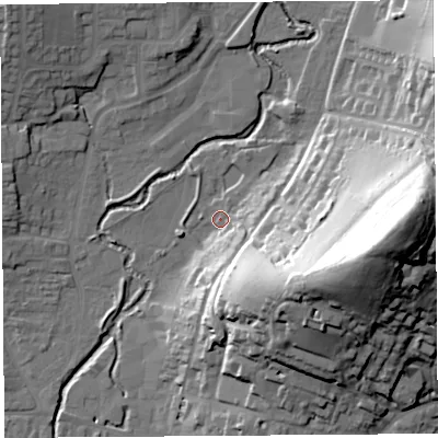 Shaded relief map of the ground around DT63XH, computed from Environment Agency LiDAR. The ground here sits at about 10 m above sea level and falls 60 m across the surrounding 800 m. Surface water reaching this point runs off ground lying to the south-east, 35.7 m higher.