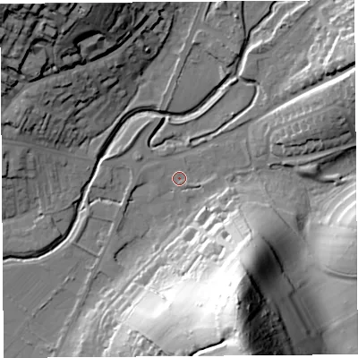Shaded relief map of the ground around DT64AA, computed from Environment Agency LiDAR. The ground here sits at about 9 m above sea level and falls 77 m across the surrounding 800 m. Surface water reaching this point runs off ground lying to the south-east, 7.1 m higher.