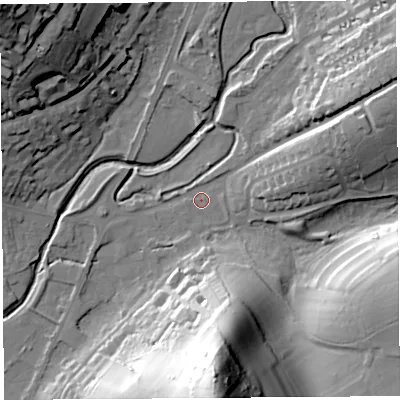 Shaded relief map of the ground around DT64AG, computed from Environment Agency LiDAR. The ground here sits at about 10 m above sea level and falls 69 m across the surrounding 800 m. Surface water reaching this point runs off ground lying to the east-north-east, 22.9 m higher.