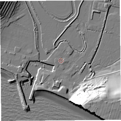 Shaded relief map of the ground around DT64EU, computed from Environment Agency LiDAR. The ground here sits at about 3 m above sea level and falls 52 m across the surrounding 800 m. Surface water reaching this point runs off ground lying to the east, 1.2 m higher.