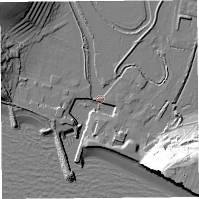 Shaded relief map of the ground around DT64HA, computed from Environment Agency LiDAR. The ground here sits at about 3 m above sea level and falls 52 m across the surrounding 800 m. Surface water reaching this point runs off ground lying to the south-east, 48.9 m higher.