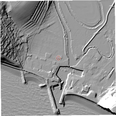 Shaded relief map of the ground around DT64HB, computed from Environment Agency LiDAR. The ground here sits at about 3 m above sea level and falls 52 m across the surrounding 800 m. Surface water reaching this point runs off ground lying to the south-south-west, 3.6 m higher.