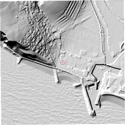 Shaded relief map of the ground around DT64HQ, computed from Environment Agency LiDAR. The ground here sits at about 5 m above sea level and falls 57 m across the surrounding 800 m. Surface water reaching this point runs off ground lying to the west, 8.2 m higher.