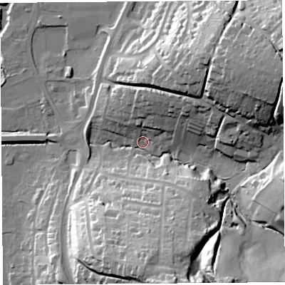 Shaded relief map of the ground around DT64JY, computed from Environment Agency LiDAR. The ground here sits at about 9 m above sea level and falls 48 m across the surrounding 800 m. Surface water reaching this point runs off ground lying to the south, 42.7 m higher.