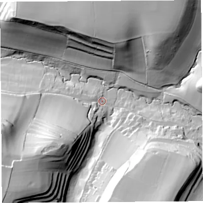 Shaded relief map of the ground around DT64NT, computed from Environment Agency LiDAR. The ground here sits at about 32 m above sea level and falls 69 m across the surrounding 800 m. Surface water reaching this point runs off ground lying to the south-west, 46.7 m higher.