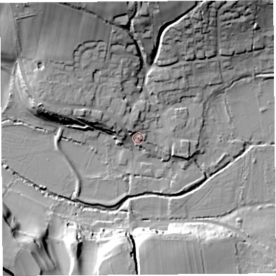 Shaded relief map of the ground around DT64QB, computed from Environment Agency LiDAR. The ground here sits at about 11 m above sea level and falls 33 m across the surrounding 800 m. Surface water reaching this point runs off ground lying to the north-north-west, 3.7 m higher.