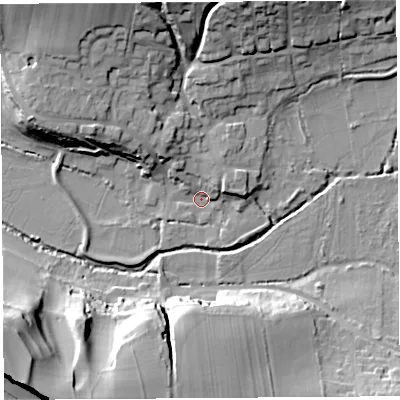 Shaded relief map of the ground around DT64QZ, computed from Environment Agency LiDAR. The ground here sits at about 6 m above sea level and falls 35 m across the surrounding 800 m. Surface water reaching this point runs off ground lying to the north-north-west, 21.1 m higher.