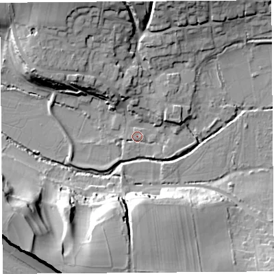Shaded relief map of the ground around DT64ST, computed from Environment Agency LiDAR. The ground here sits at about 6 m above sea level and falls 36 m across the surrounding 800 m. Surface water reaching this point runs off ground lying to the north-north-west, 18.5 m higher.