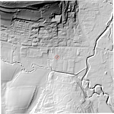 Shaded relief map of the ground around DT65AA, computed from Environment Agency LiDAR. The ground here sits at about 8 m above sea level and falls 72 m across the surrounding 800 m. Surface water reaching this point runs off ground lying to the north-north-west, 66.9 m higher.