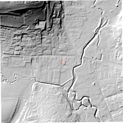 Shaded relief map of the ground around DT65BY, computed from Environment Agency LiDAR. The ground here sits at about 8 m above sea level and falls 78 m across the surrounding 800 m. Surface water reaching this point runs off ground lying to the south-east, 1.2 m higher.