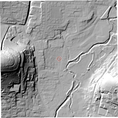 Shaded relief map of the ground around DT65DH, computed from Environment Agency LiDAR. The ground here sits at about 10 m above sea level and falls 75 m across the surrounding 800 m. Surface water reaching this point runs off ground lying to the west-north-west, 6.4 m higher.