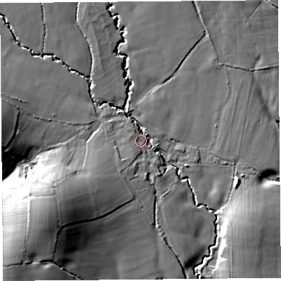 Shaded relief map of the ground around DT65PF, computed from Environment Agency LiDAR. The ground here sits at about 62 m above sea level and falls 23 m across the surrounding 800 m. Surface water reaching this point runs off ground lying to the south-west, 17.1 m higher.