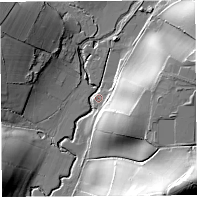 Shaded relief map of the ground around DT65PG, computed from Environment Agency LiDAR. The ground here sits at about 15 m above sea level and falls 68 m across the surrounding 800 m. Surface water reaching this point runs off ground lying to the east-north-east, 34.7 m higher.