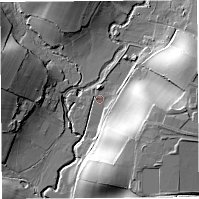Shaded relief map of the ground around DT65PJ, computed from Environment Agency LiDAR. The ground here sits at about 15 m above sea level and falls 36 m across the surrounding 800 m. Surface water reaching this point runs off ground lying to the east-south-east, 30.6 m higher.
