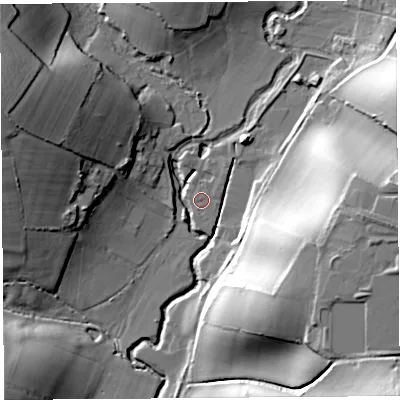 Shaded relief map of the ground around DT65QT, computed from Environment Agency LiDAR. The ground here sits at about 15 m above sea level and falls 46 m across the surrounding 800 m. Surface water reaching this point runs off ground lying to the north-east, 1.2 m higher.