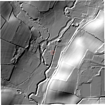 Shaded relief map of the ground around DT65QU, computed from Environment Agency LiDAR. The ground here sits at about 15 m above sea level and falls 40 m across the surrounding 800 m. Surface water reaching this point runs off ground lying to the east, 31.5 m higher.