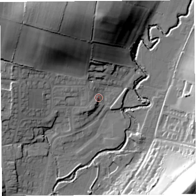 Shaded relief map of the ground around DT65RN, computed from Environment Agency LiDAR. The ground here sits at about 14 m above sea level and falls 58 m across the surrounding 800 m. Surface water reaching this point runs off ground lying to the north-north-west, 38.0 m higher.