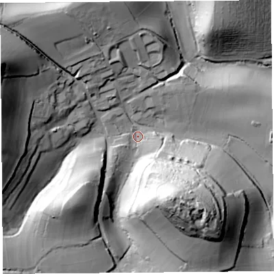 Shaded relief map of the ground around DT66HA, computed from Environment Agency LiDAR. The ground here sits at about 21 m above sea level and falls 67 m across the surrounding 800 m. Surface water reaching this point runs off ground lying to the west-north-west, 59.4 m higher.