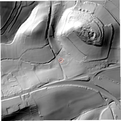 Shaded relief map of the ground around DT66HE, computed from Environment Agency LiDAR. The ground here sits at about 29 m above sea level and falls 60 m across the surrounding 800 m. Surface water reaching this point runs off ground lying to the north-east, 38.5 m higher.
