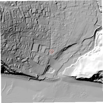 Shaded relief map of the ground around DT66LR, computed from Environment Agency LiDAR. The ground here sits at about 10 m above sea level and falls 63 m across the surrounding 800 m. Surface water reaching this point runs off ground lying to the west-north-west, 51.0 m higher.