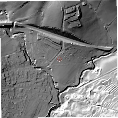 Shaded relief map of the ground around DT66LU, computed from Environment Agency LiDAR. The ground here sits at about 12 m above sea level and falls 58 m across the surrounding 800 m. Surface water reaching this point runs off ground lying to the north, 8.4 m higher.
