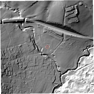 Shaded relief map of the ground around DT66QL, computed from Environment Agency LiDAR. The ground here sits at about 9 m above sea level and falls 42 m across the surrounding 800 m. Surface water reaching this point runs off ground lying to the north-east, 10.9 m higher.
