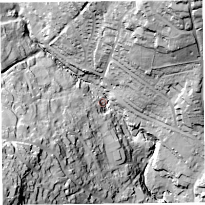 Shaded relief map of the ground around DT73AL, computed from Environment Agency LiDAR. The ground here sits at about 18 m above sea level and falls 88 m across the surrounding 800 m. Surface water reaching this point runs off ground lying to the west-south-west, 69.7 m higher.