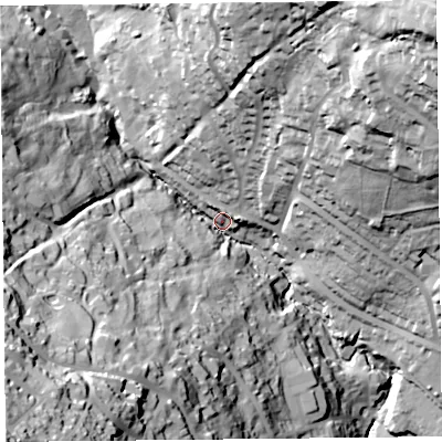 Shaded relief map of the ground around DT73AW, computed from Environment Agency LiDAR. The ground here sits at about 23 m above sea level and falls 91 m across the surrounding 800 m. Surface water reaching this point runs off ground lying to the south-west, 80.5 m higher.