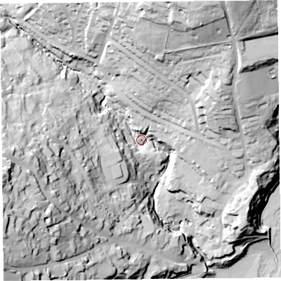 Shaded relief map of the ground around DT73PN, computed from Environment Agency LiDAR. The ground here sits at about 14 m above sea level and falls 73 m across the surrounding 800 m. Surface water reaching this point runs off ground lying to the north-north-east, 57.2 m higher.