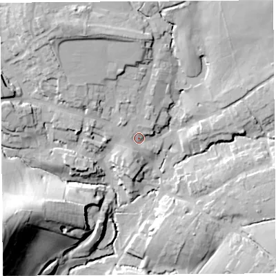 Shaded relief map of the ground around DT83AX, computed from Environment Agency LiDAR. The ground here sits at about 58 m above sea level and falls 52 m across the surrounding 800 m. Surface water reaching this point runs off ground lying to the north-west, 4.8 m higher.