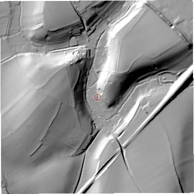 Shaded relief map of the ground around DT94PW, computed from Environment Agency LiDAR. The ground here sits at about 87 m above sea level and falls 35 m across the surrounding 800 m. Surface water reaching this point runs off ground lying to the west, 34.6 m higher.