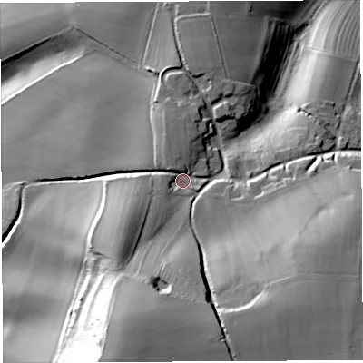 Shaded relief map of the ground around DT94QY, computed from Environment Agency LiDAR. The ground here sits at about 71 m above sea level and falls 55 m across the surrounding 800 m. Surface water reaching this point runs off ground lying to the south-west, 14.6 m higher.