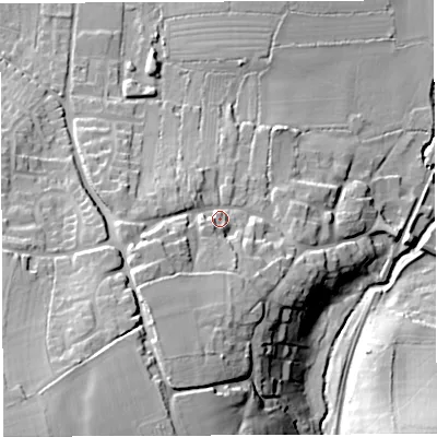 Shaded relief map of the ground around DT96LF, computed from Environment Agency LiDAR. The ground here sits at about 62 m above sea level and falls 42 m across the surrounding 800 m. Surface water reaching this point runs off ground lying to the south-west, 13.8 m higher.